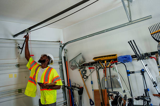 Professional Garage Door Roller Replacement technician working in Spencerville, MD